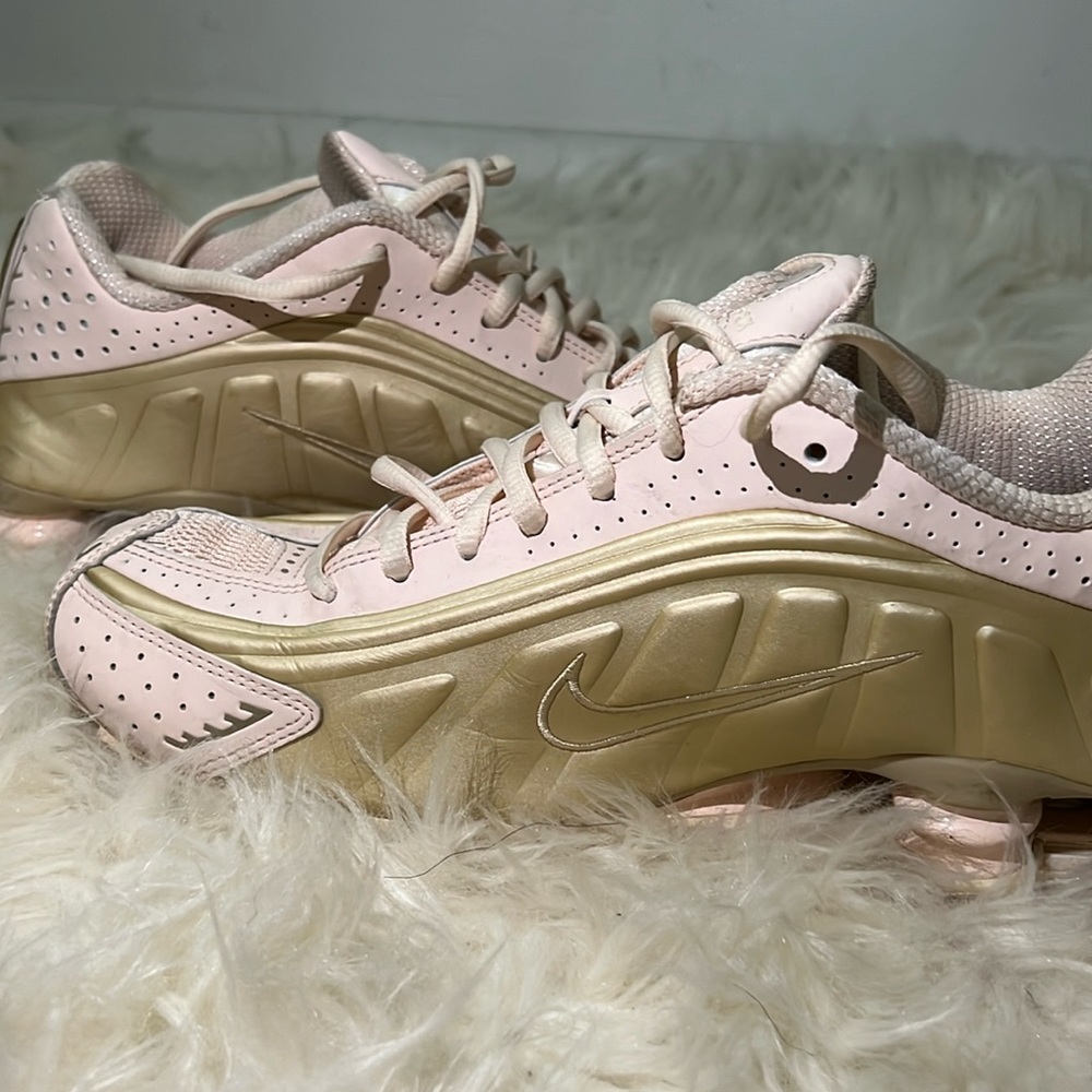 Nike shox pink and gold sneaker